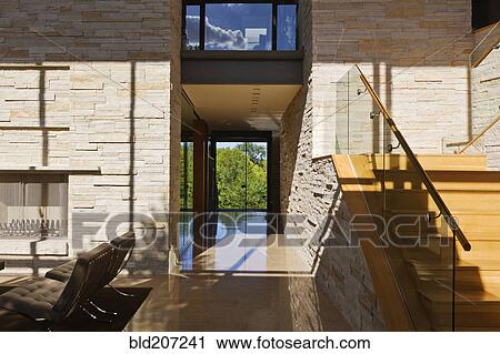 Stock Image - Upscale Living Room and Hallway. Fotosearch