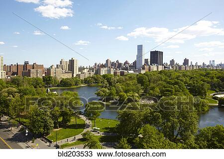 Stock Image - Urban park and skyscrapers, New York, New York, United States. Fotosearch