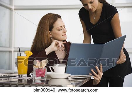 Waitress taking businesswomanÆs order View Large Photo Image Stock Image - Waitress taking businesswomanÆs order. Fotosearch