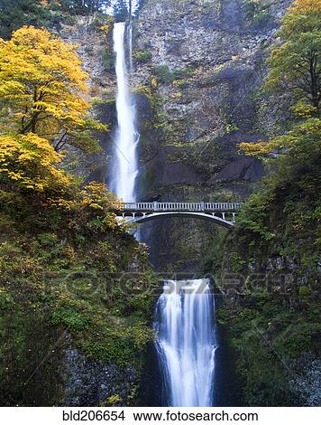 Waterfall and Bridge in Autumn View Large Photo Image Picture - Waterfall and Bridge in Autumn. Fotosearch