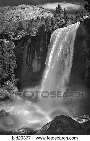 Stock Image - Waterfall and rocky river, Yosemite, California, United States. Fotosearch