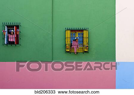 Stock Image - Windows in Colorful Building Exterior. Fotosearch