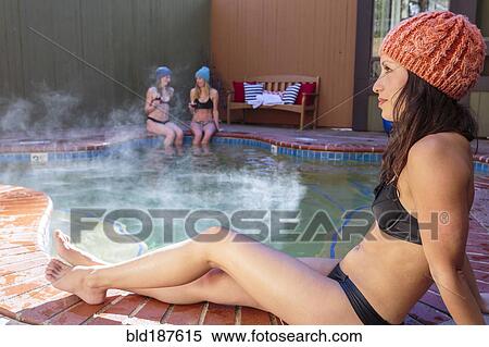 Stock Photography - Woman relaxing in hot tub. Fotosearch