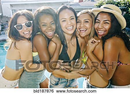 Women hugging near swimming pool View Large Photo Image Stock Photograph - Women hugging near swimming pool. Fotosearch
