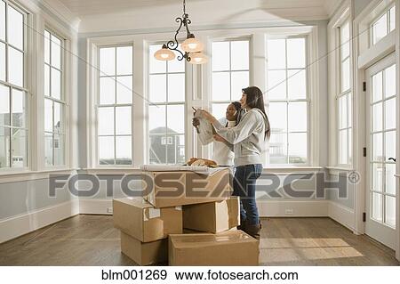 Stock Photo - Women planning interior design. Fotosearch