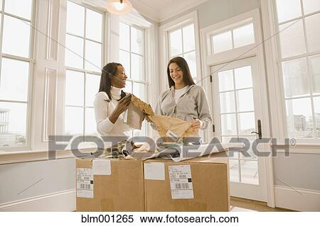 Women planning interior design View Large Photo Image Stock Photography - Women planning interior design. Fotosearch