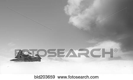 Stock Photo - Wooden house in snowy landscape. Fotosearch