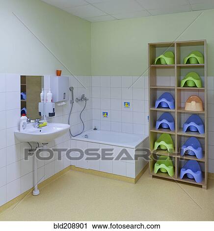 A bathroom, and shower, with hand basin and storage for pots View Large Photo Image Stock Image - A bathroom, and shower, with hand basin and storage for pots. Fotosearch