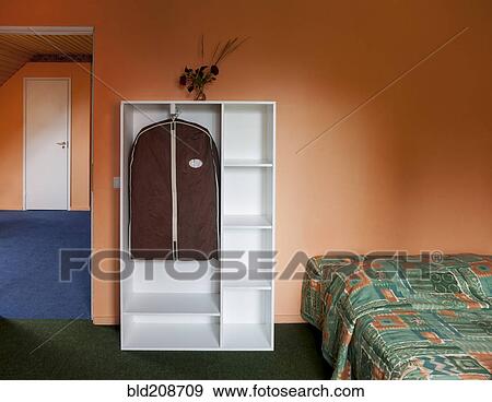 A bedroom with ochre painted walls View Large Photo Image Stock Photo - A bedroom with ochre painted walls. Fotosearch