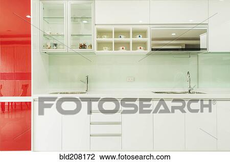 Stock Image - A contemporary style fitted kitchen. Fotosearch