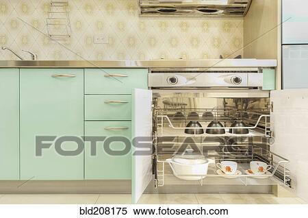 Stock Photography - A contemporary style fitted kitchen. Fotosearch