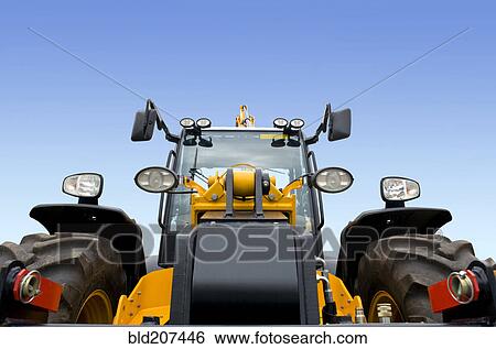 Stock Photograph - A frontal view of a spotless modern digger. Fotosearch