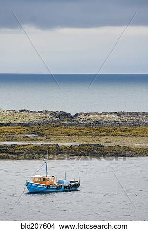Picture - A harbor sea wall on the Isle of Skye. Fotosearch