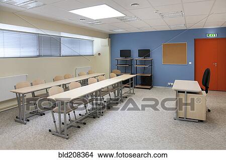 Picture - A large room with tables and chairs. Fotosearch