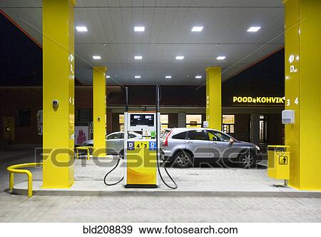 A roadside garage at night View Large Photo Image Stock Photo - A roadside garage at night. Fotosearch