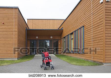 A small child's buggy pushchair with a red seat View Large Photo Image Stock Image - A small child's buggy pushchair with a red seat. Fotosearch