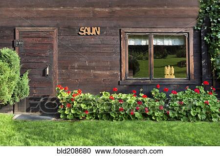 Stock Image - A small sauna cabin in woodland. Fotosearch