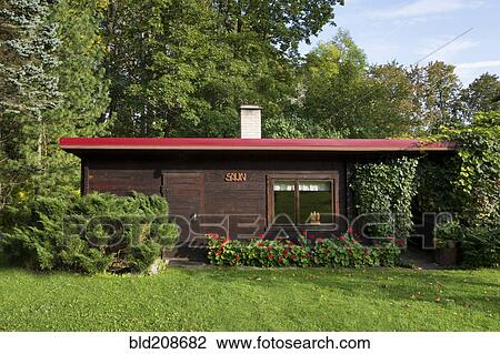 A small sauna cabin in woodland View Large Photo Image Stock Image - A small sauna cabin in woodland. Fotosearch