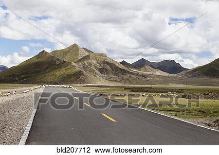 Stock Image - A tarmac metaled road in the mountains of Western Tibet. Fotosearch