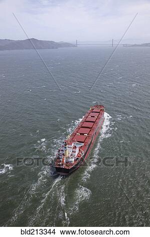 Aerial view of container ship in urban harbor, San Francisco, California, United States View Large Photo Image Picture - Aerial view of container ship in urban harbor, San Francisco, California, United States. Fotosearch