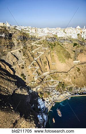 Stock Photography - Aerial view of hilltop town and bay, Thira, Egeo, Greece. Fotosearch