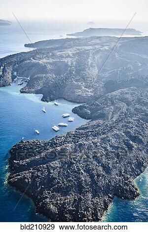 Stock Photo - Aerial view of rocky rural coastline, Santorini, Egeo, Greece. Fotosearch
