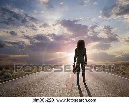 African American businesswoman standing on remote highway View Large Photo Image Stock Image - African American businesswoman standing on remote highway. Fotosearch