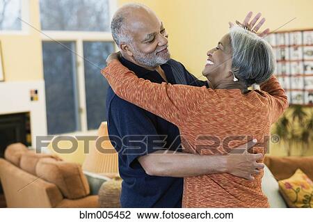 African American couple dancing in living room View Large Photo Image Stock Image - African American couple dancing in living room. Fotosearch