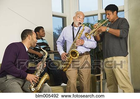 African American family playing saxophone together View Large Photo Image Stock Image - African American family playing saxophone together. Fotosearch