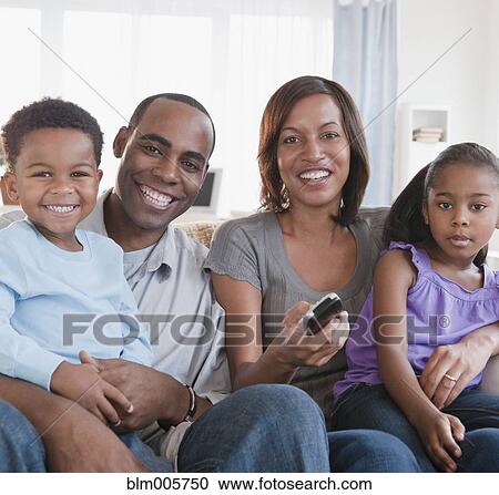 African American family watching television together View Large Photo Image Stock Image - African American family watching television together. Fotosearch