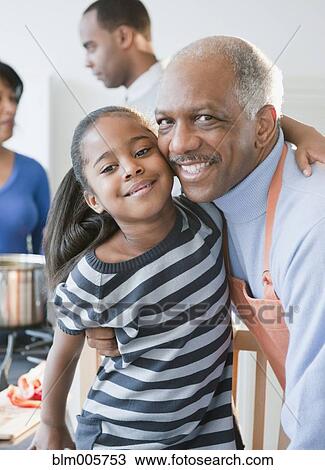 African American grandfather hugging granddaughter View Large Photo Image Stock Image - African American grandfather hugging granddaughter. Fotosearch