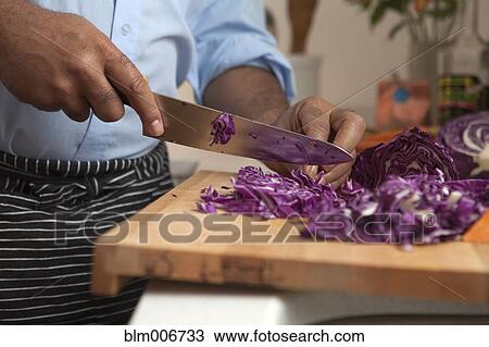 African American man cutting red cabbage View Large Photo Image Stock Image - African American man cutting red cabbage. Fotosearch