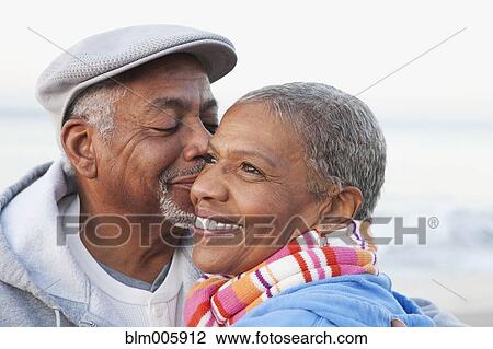 African American man kissing wife View Large Photo Image Stock Image - African American man kissing wife. Fotosearch