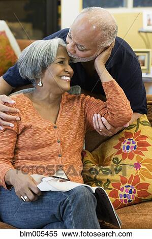 African American man kissing wife's forehead View Large Photo Image Stock Photography - African American man kissing wife's forehead. Fotosearch