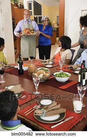 African American man serving Thanksgiving turkey View Large Photo Image Stock Image - African American man serving Thanksgiving turkey. Fotosearch