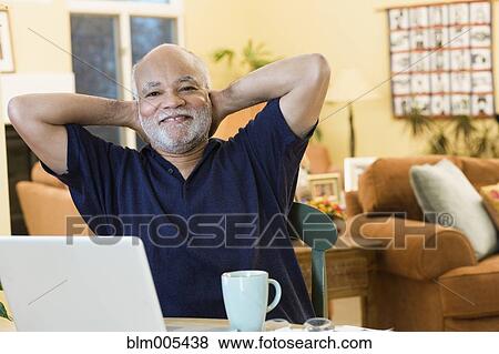 African American man with hands behind head View Large Photo Image Stock Photo - African American man with hands behind head. Fotosearch