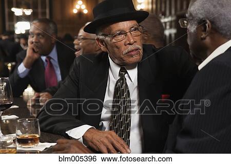 African American men drinking at bar View Large Photo Image Stock Photograph - African American men drinking at bar. Fotosearch