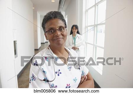 African American nurse in hospital hallway View Large Photo Image Stock Photograph - African American nurse in hospital hallway. Fotosearch