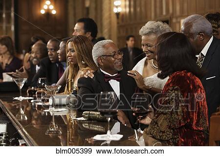 African American people drinking at bar View Large Photo Image Stock Photo - African American people drinking at bar. Fotosearch