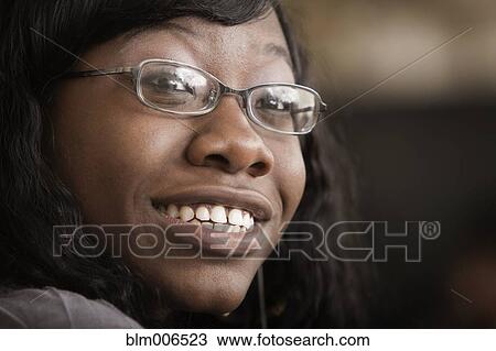 Stock Image - African American student smiling. Fotosearch