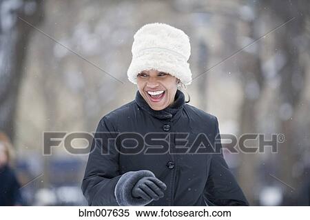 African American woman in coat and fur hat View Large Photo Image Stock Photography - African American woman in coat and fur hat. Fotosearch