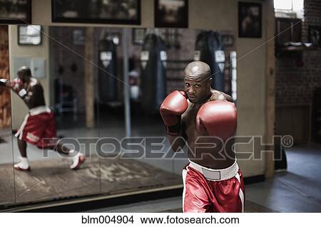 African boxer training in gym View Large Photo Image Picture - African boxer training in gym. Fotosearch