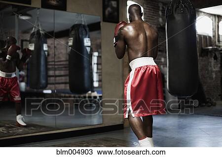 African boxer training in gym View Large Photo Image Stock Image - African boxer training in gym. Fotosearch
