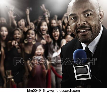 Stock Photograph - African broadcaster at red carpet event. Fotosearch