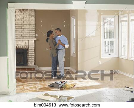 African couple dancing in half-decorated livingroom View Large Photo Image Stock Image - African couple dancing in half-decorated livingroom. Fotosearch