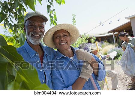 African couple doing community yardwork View Large Photo Image Picture - African couple doing community yardwork. Fotosearch