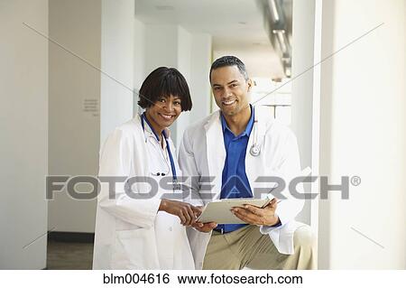 African doctors consulting on medical chart View Large Photo Image Stock Photograph - African doctors consulting on medical chart. Fotosearch