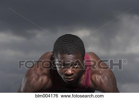 Stock Photograph - African man looking serious. Fotosearch