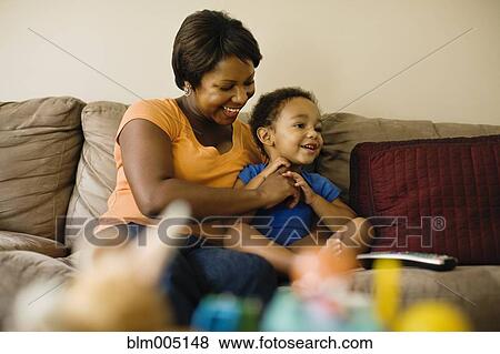 African mother playing with young son View Large Photo Image Stock Photo - African mother playing with young son. Fotosearch