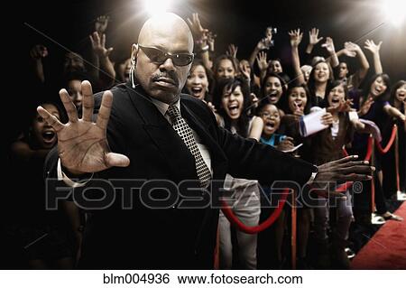 African security guard at red carpet event View Large Photo Image Stock Photograph - African security guard at red carpet event. Fotosearch